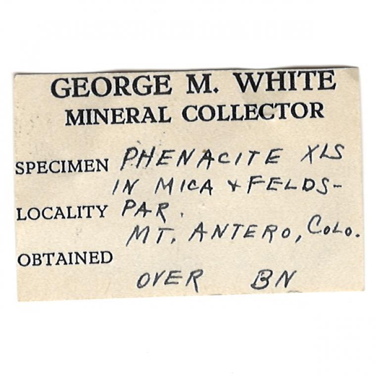 PHENAKITE on MUSCOVITE