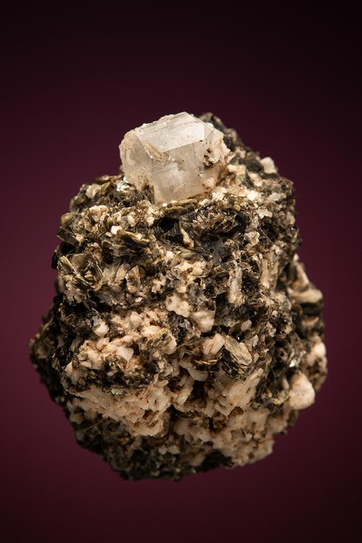 PHENAKITE on MUSCOVITE