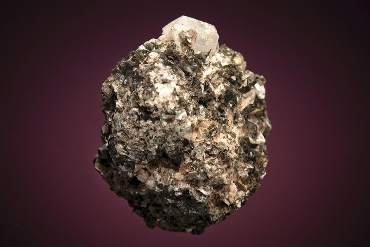 PHENAKITE on MUSCOVITE