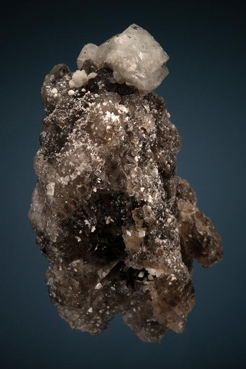 PHENAKITE with HEMATITE on QUARTZ