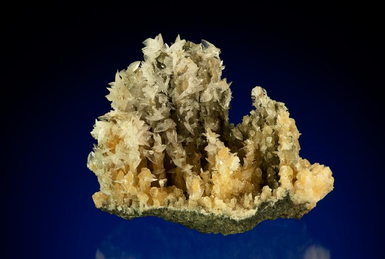 COLEMANITE on CALCITE