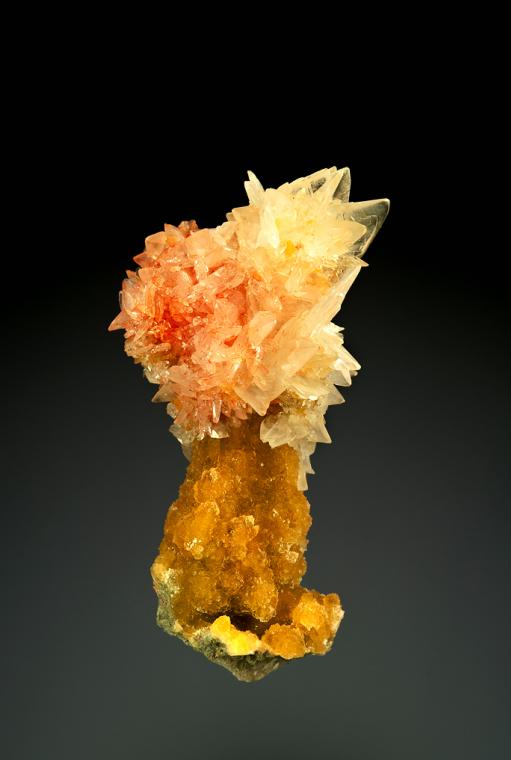 COLEMANITE with REALGAR on CALCITE