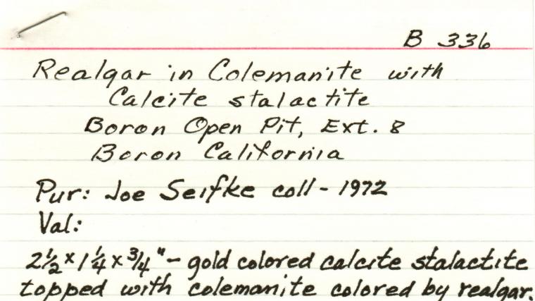 COLEMANITE with REALGAR on CALCITE