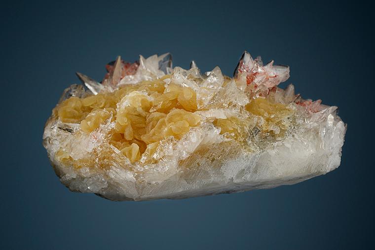 COLEMANITE with REALGAR and CALCITE