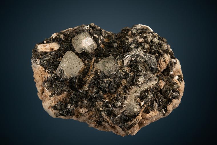 PHENAKITE on MUSCOVITE