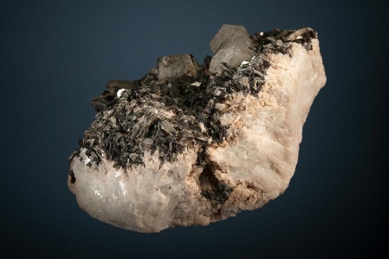 PHENAKITE on MUSCOVITE