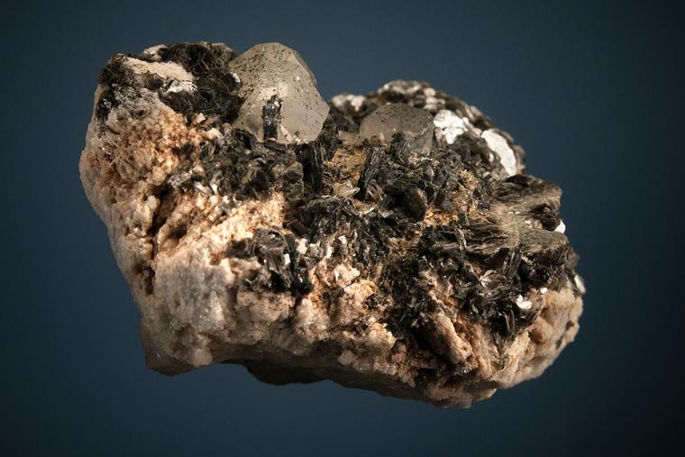 PHENAKITE on MUSCOVITE