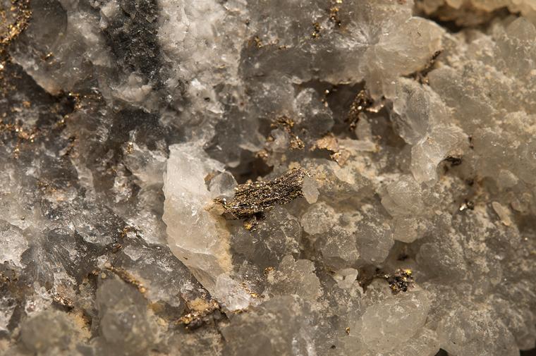 MELONITE after CALAVERITE on QUARTZ