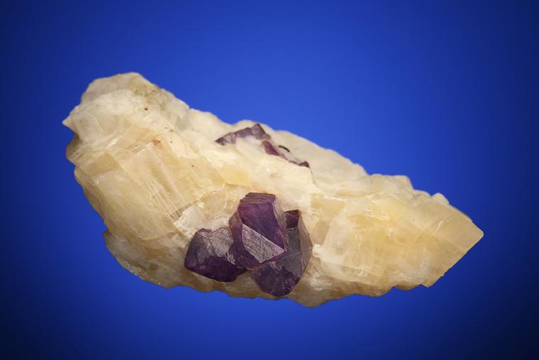 CORUNDUM var. Sapphire in CALCITE