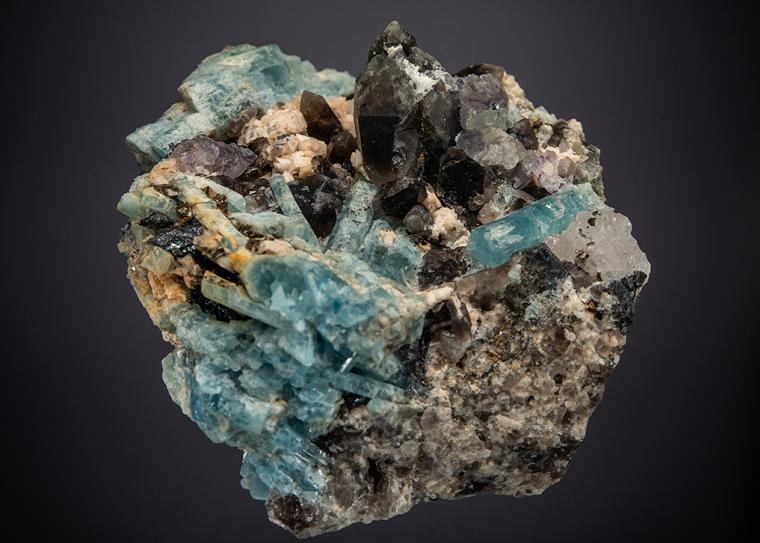 BERYL var. Aquamarine WITH QUARTZ var. Smoky, Adularia, FLUORITE and HEMATITE