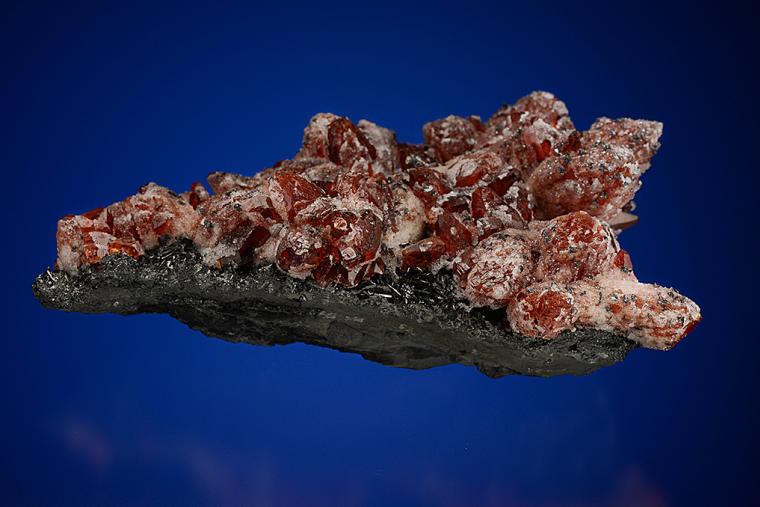 RHODOCHROSITE with QUARTZ on MANGANITE