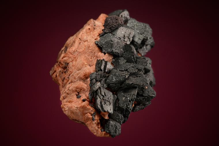 HEMATITE on MICROCLINE