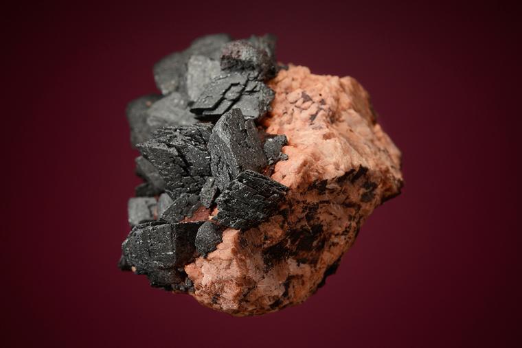 HEMATITE on MICROCLINE