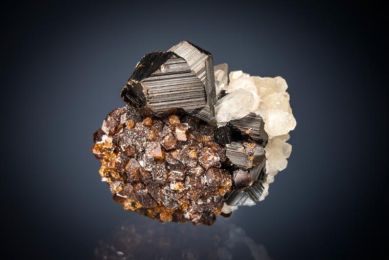 SPHALERITE with QUARTZ and CALCITE on ANDRADITE