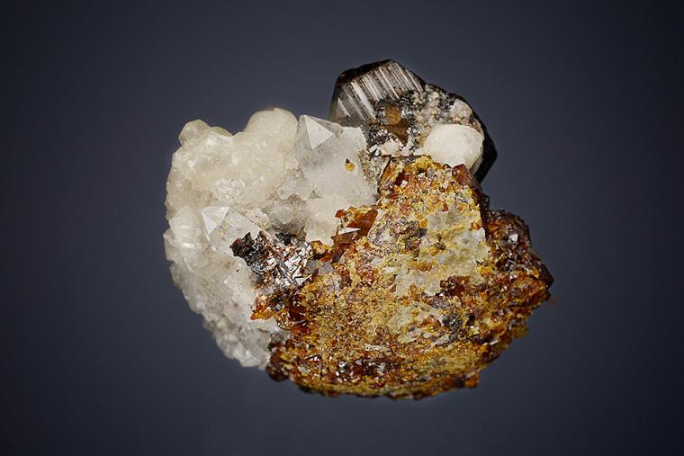 SPHALERITE with QUARTZ and CALCITE on ANDRADITE