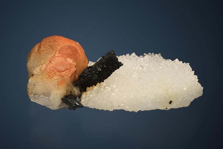 ACANTHITE after PYRARGYRITE(?) with CALCITE on QUARTZ