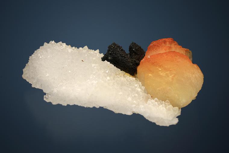 ACANTHITE after PYRARGYRITE(?) with CALCITE on QUARTZ