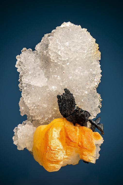 ACANTHITE after PYRARGYRITE(?) with CALCITE on QUARTZ