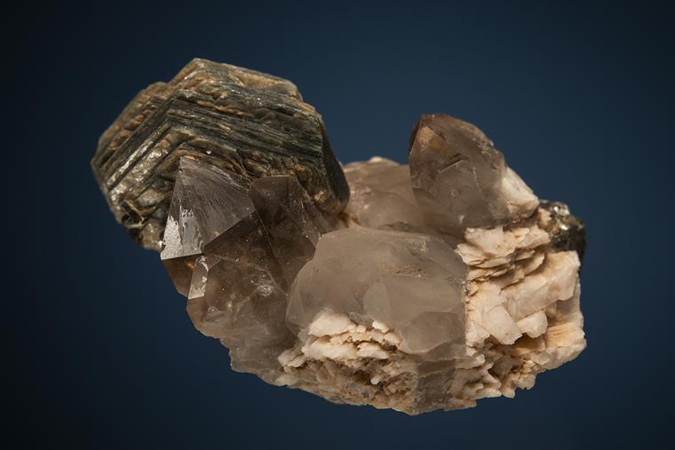 MUSCOVITE on QUARTZ var. Smoky and MICROCLINE