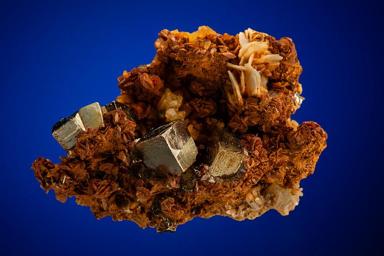 PYRITE with BARITE on SIDERITE and QUARTZ