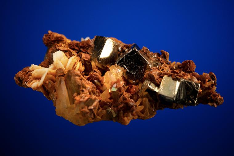 PYRITE with BARITE on SIDERITE and QUARTZ