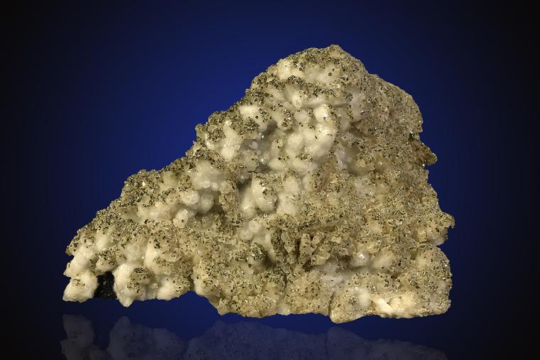 PYRITE with DOLOMITE on QUARTZ