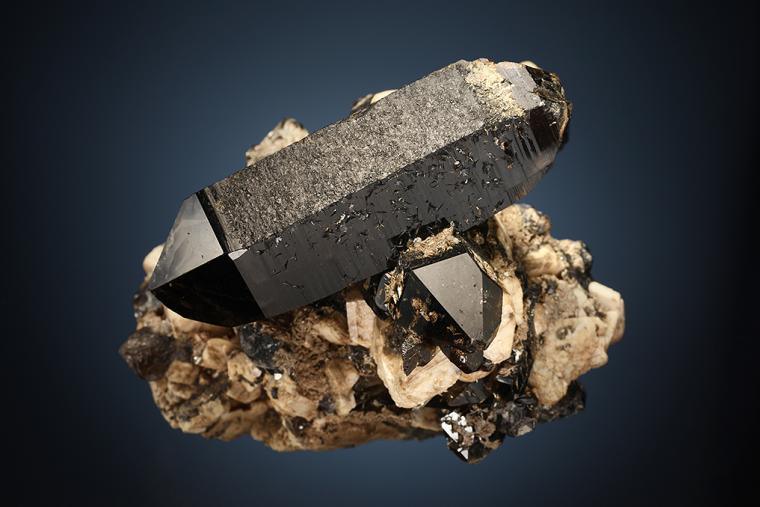 QUARTZ var. Smoky on MICROCLINE