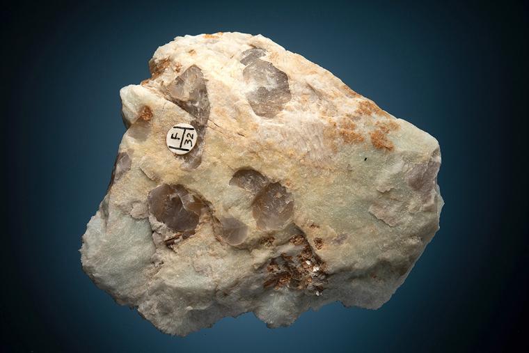 SPESSARTINE with QUARTZ var. Smoky on ALBITE var. Cleavelandite