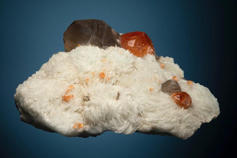 SPESSARTINE with QUARTZ var. Smoky on ALBITE var. Cleavelandite