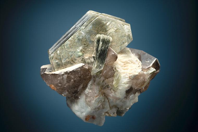 SPESSARTINE with MUSCOVITE and QUARTZ var. Smoky on ALBITE var. Cleavelandite