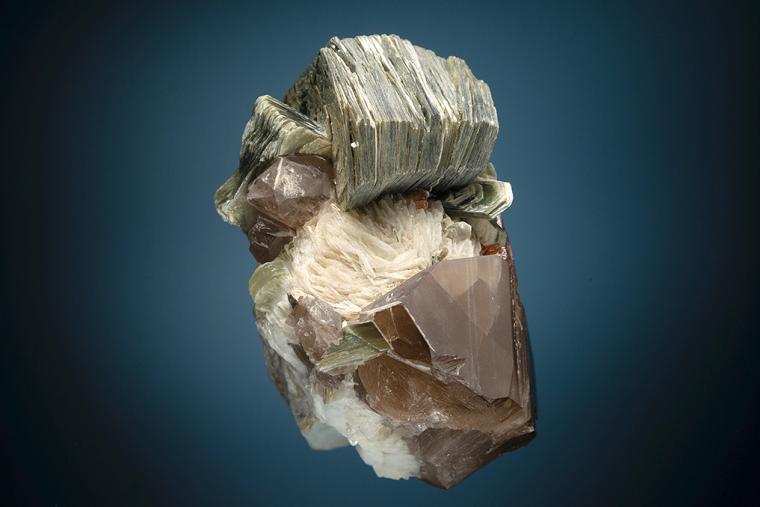 SPESSARTINE with MUSCOVITE and QUARTZ var. Smoky on ALBITE var. Cleavelandite