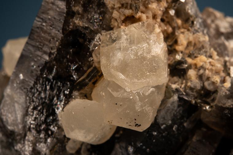 PHENAKITE on QUARTZ var. Smoky