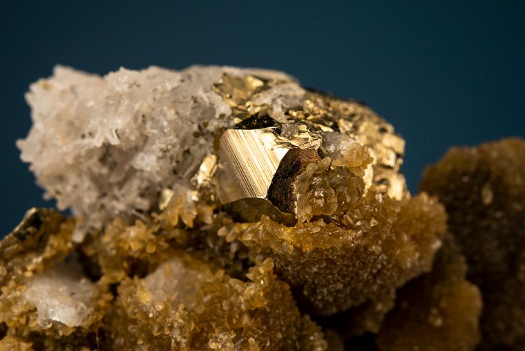 SIDERITE with PYRITE on QUARTZ