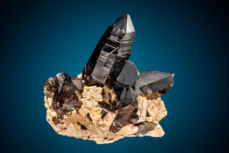 QUARTZ var. Smoky on MICROCLINE