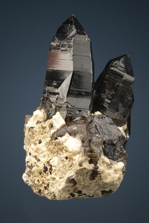 QUARTZ var. Smoky on MICROCLINE