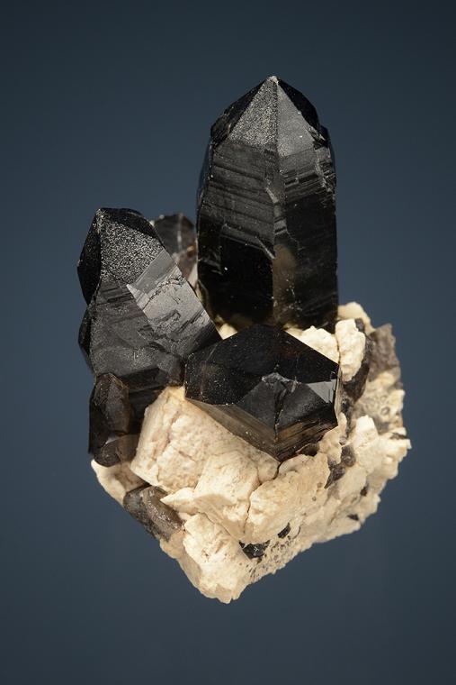 QUARTZ var. Smoky on MICROCLINE