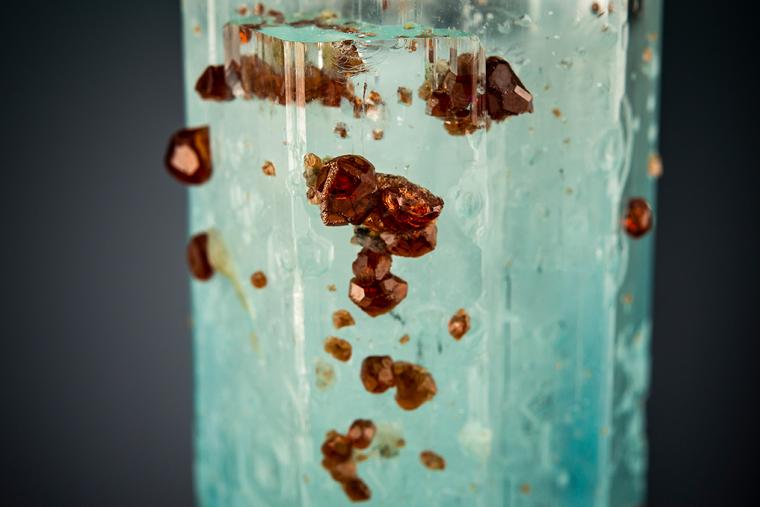 SPESSARTINE on BERYL var. Aquamarine