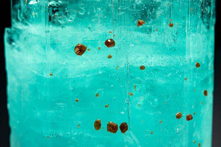 BERYL var. Aquamarine with SPESSARTINE