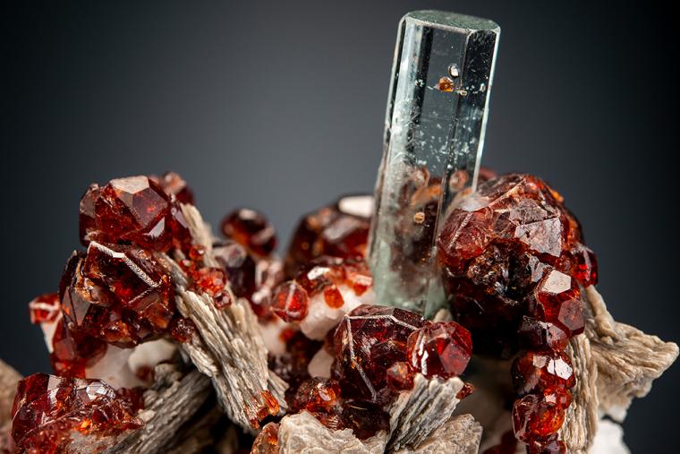 BERYL var. Aquamarine with SPESSARTINE on MUSCOVITE