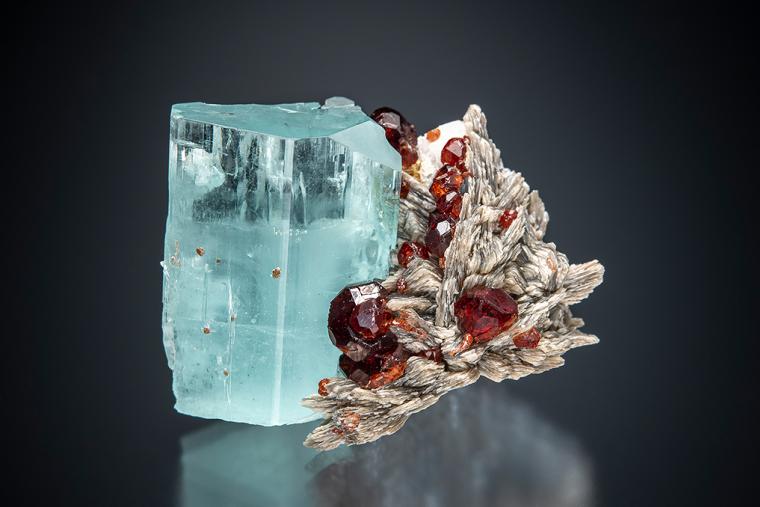 BERYL var. Aquamarine with SPESSARTINE on MUSCOVITE