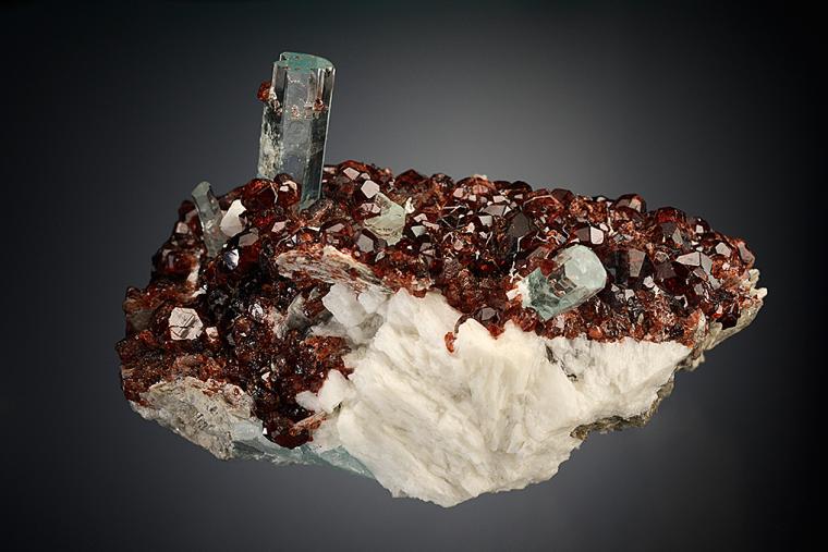 BERYL var. Aquamarine with SPESSARTINE on MICROCLINE and MUSCOVITE