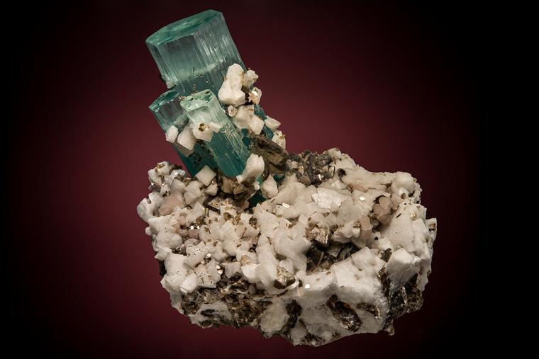 BERYL var. Aquamarine on FELDSPAR