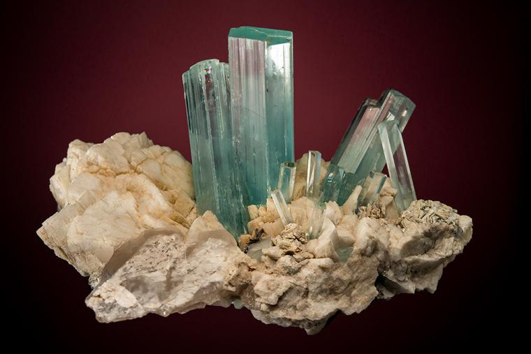 BERYL var. Aquamarine on FELDSPAR