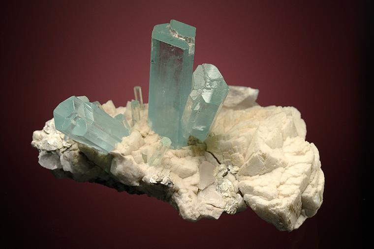 BERYL var. Aquamarine on FELDSPAR