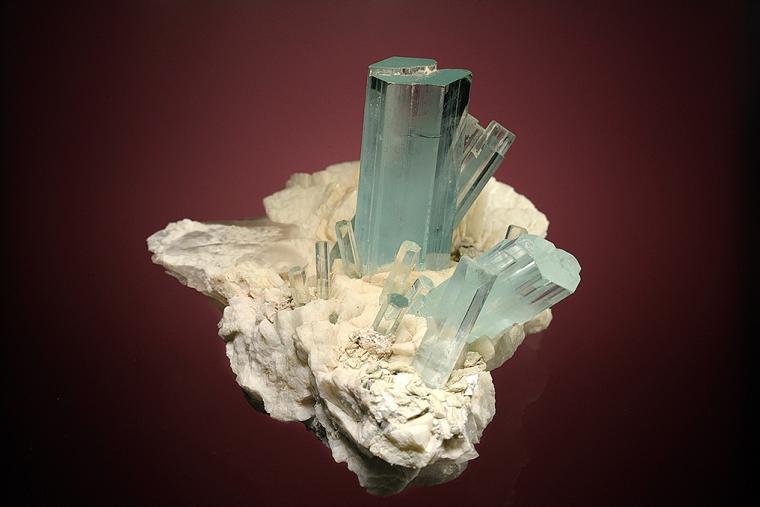 BERYL var. Aquamarine on FELDSPAR