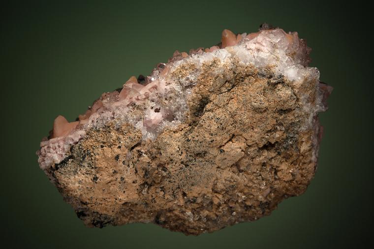 RHODOCHROSITE after CALCITE on QUARTZ var. Amethyst