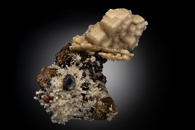 CALCITE with PYRRHOTITE and SPHALERITE on QUARTZ