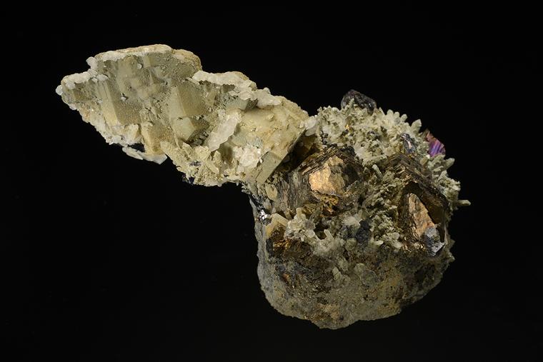 CALCITE with PYRRHOTITE and SPHALERITE on QUARTZ
