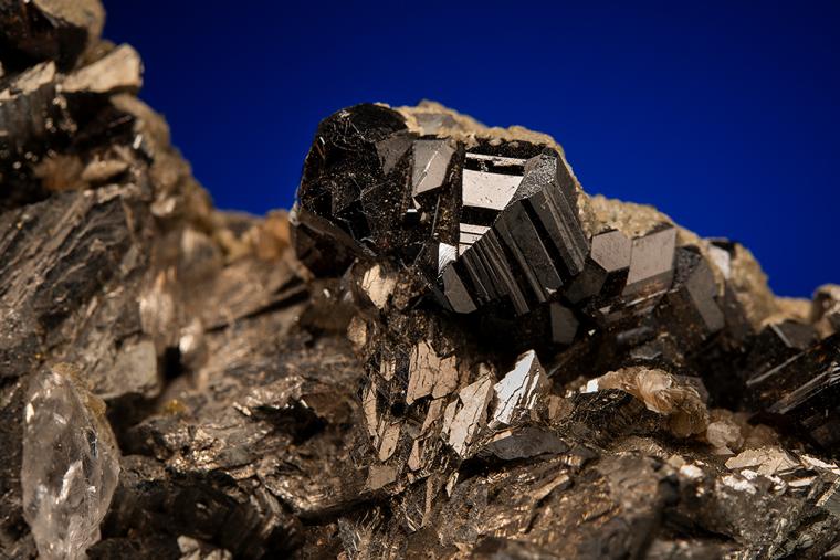 CASSITERITE and FLUORAPATITE on ARSENOPYRITE