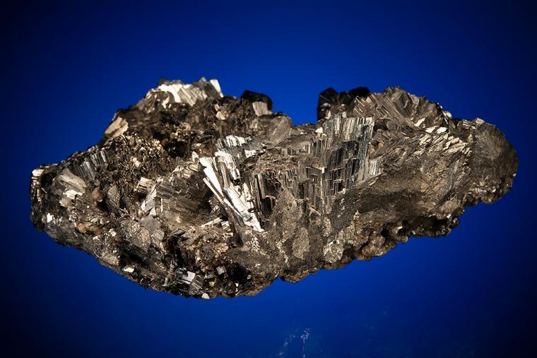 CASSITERITE and FLUORAPATITE on ARSENOPYRITE
